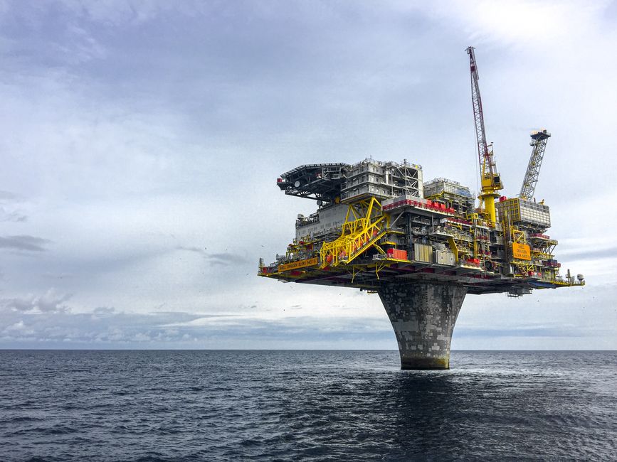 Offshore energy platform at sunset